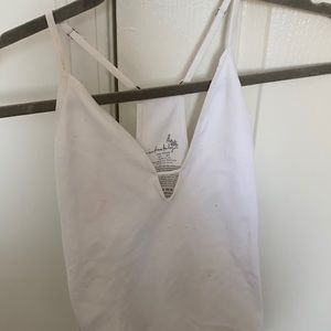 white Free People bodysuit